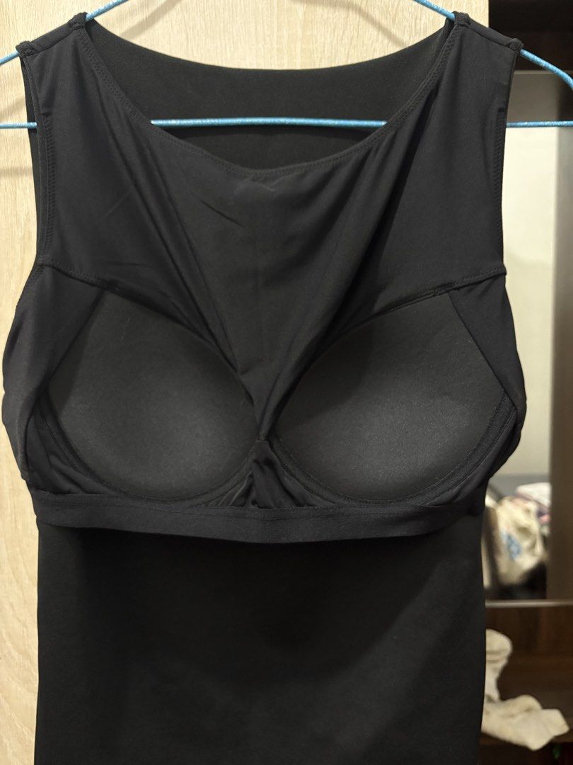Uniqlo Black Bra Top Size L (Category: Sleeveless) located in Pasig City. Submitted by munchinitajanella (Listing ID 1465617364, Image 3). Description: - Brand: Uniqlo - Size: L (Fits bust 85 to 91 cm) - Color: Solid black - Design: Sleeveless scoop neck with built-in cups for easy, bra-free wear - Material: Shell made of polyester, spandex, and recycled polyester; lining made of nylon and spandex - Condition: Great everyday basic, super convenie
