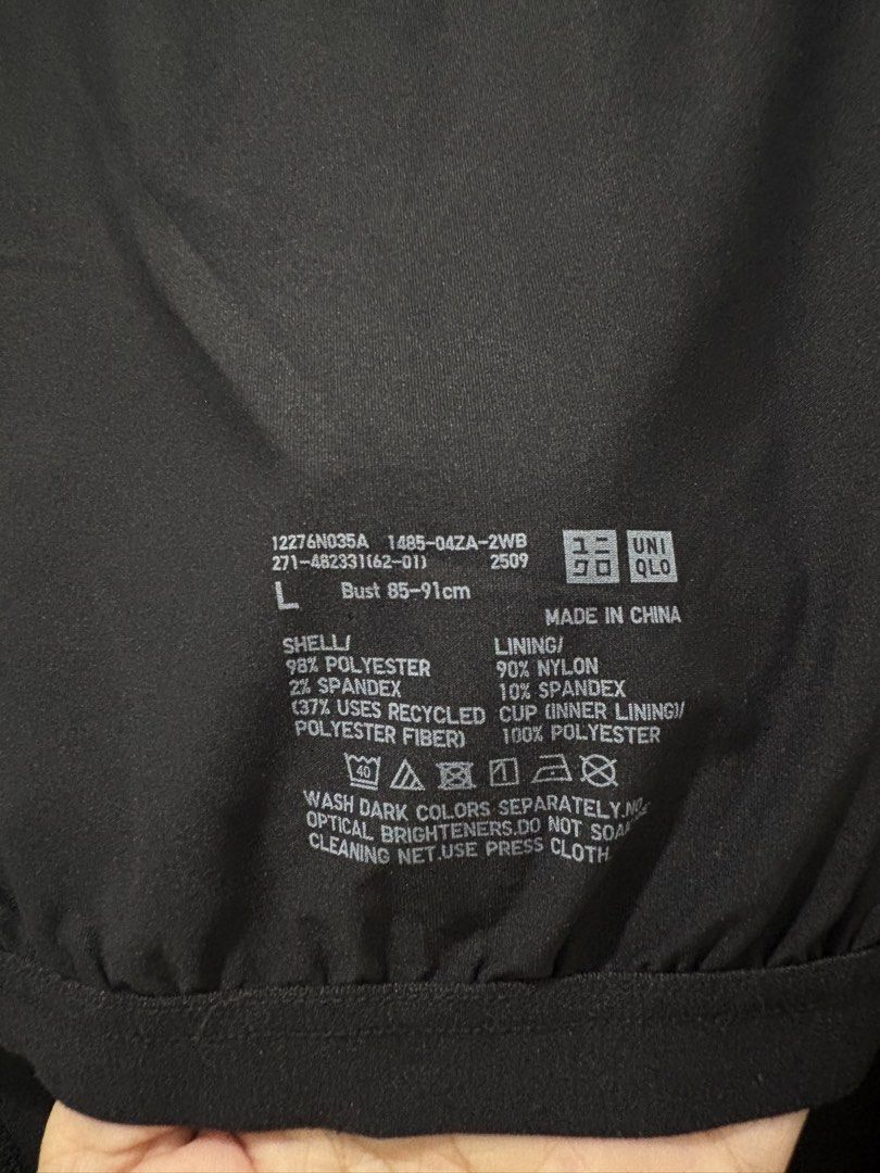 Uniqlo Black Bra Top Size L (Category: Sleeveless) located in Pasig City. Submitted by munchinitajanella (Listing ID 1465617364, Image 2). Description: - Brand: Uniqlo - Size: L (Fits bust 85 to 91 cm) - Color: Solid black - Design: Sleeveless scoop neck with built-in cups for easy, bra-free wear - Material: Shell made of polyester, spandex, and recycled polyester; lining made of nylon and spandex - Condition: Great everyday basic, super convenie