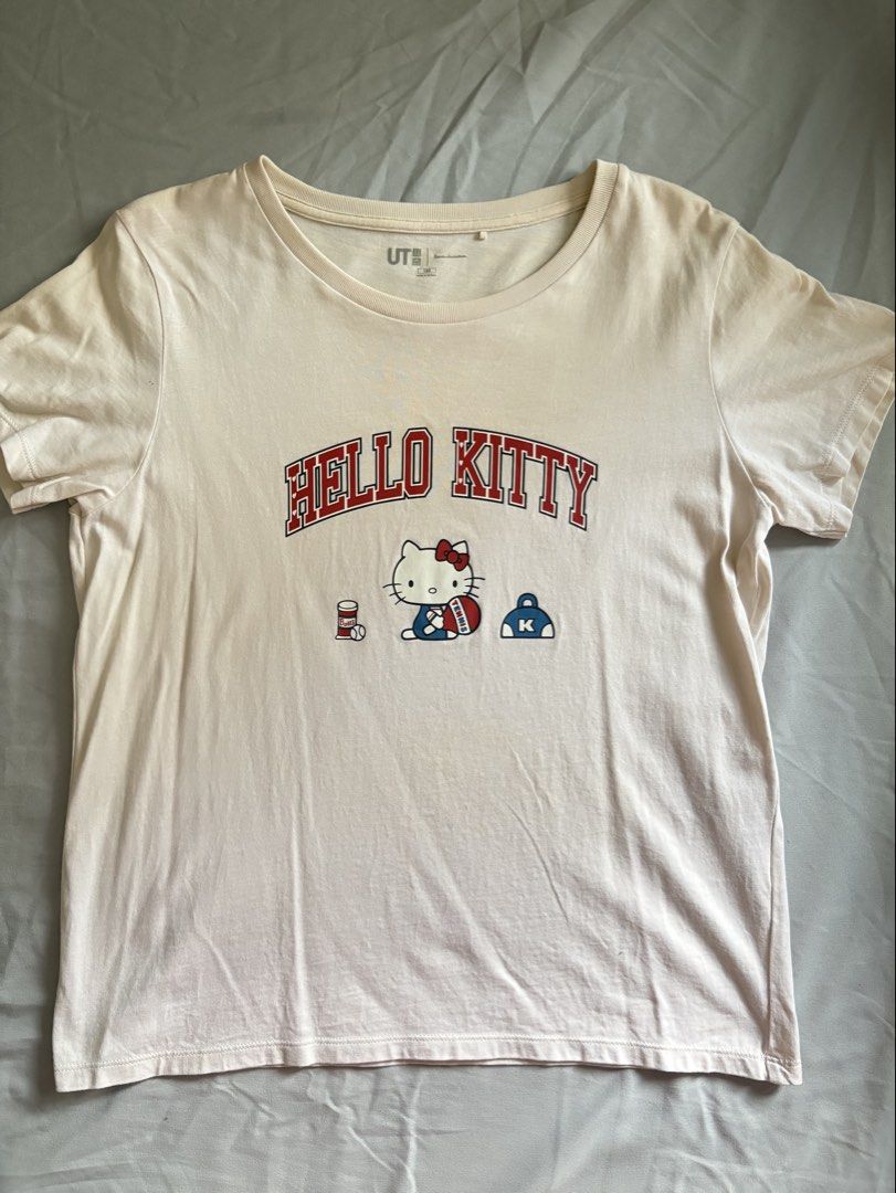 Uniqlo Hello Kitty graphic tee (Category: Shirts) located in Binan City. Submitted by moonlight.26 (Listing ID 1465630658, Image 1). Description: - T shirt, normal length - Graphic Tee - rfs: decluttering.