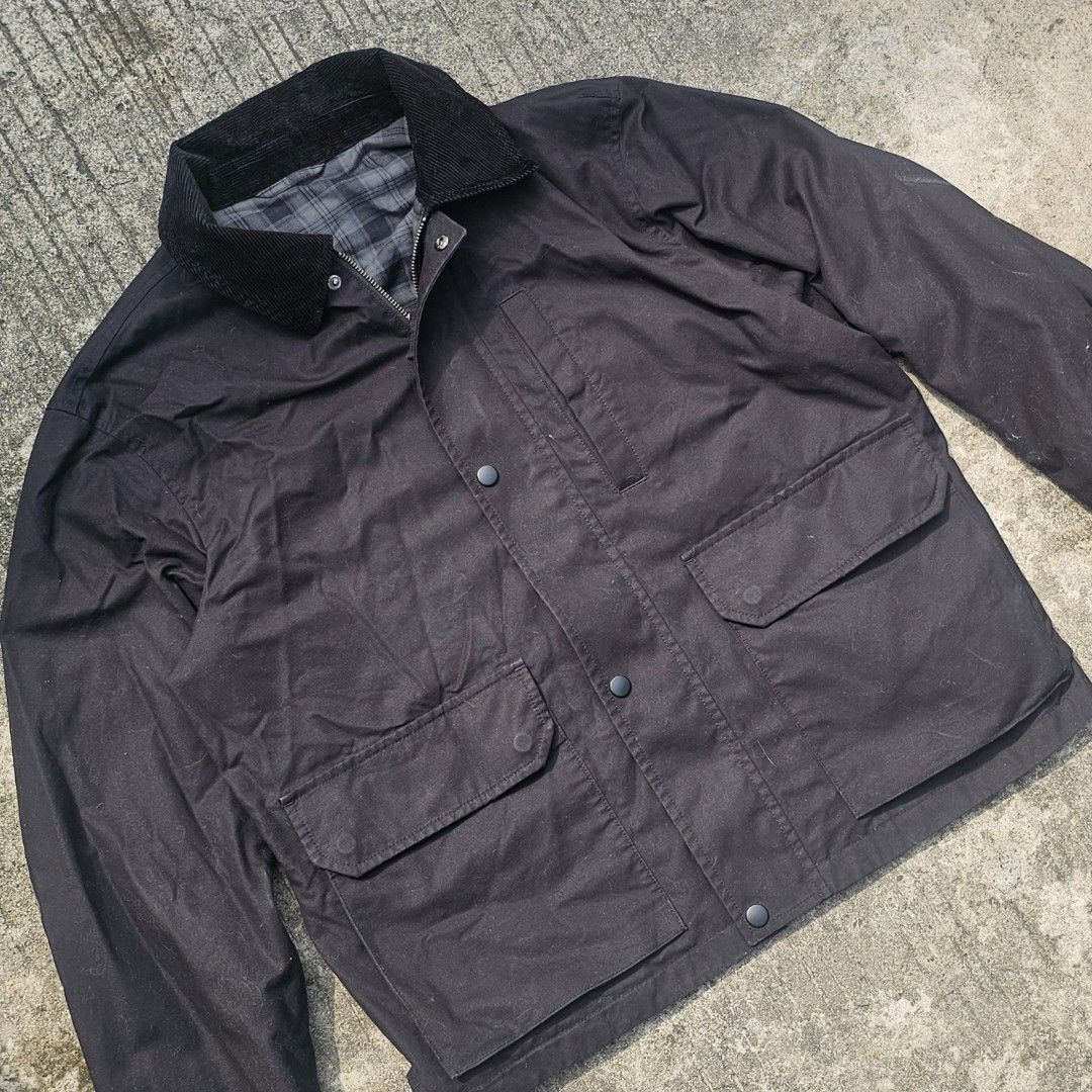 Uniqlo jacket (Category: Coats, Jackets and Outerwear) located in Dasmarinas. Submitted by thriftxstop (Listing ID 1465624930, Image 2). Description: - Style: Rugged utility field jacket / workwear - Material: Sturdy black cotton canvas with soft grey plaid flannel lining - Details: Classic contrasting dark brown corduroy collar and button cuffs - Closure: Full zipper combined with front snap buttons - Pockets: Large lower utility flap pockets an