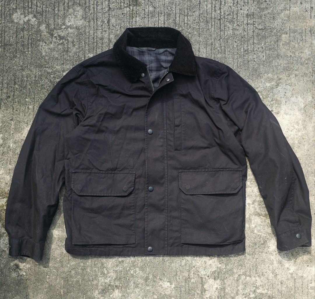 Uniqlo jacket (Category: Coats, Jackets and Outerwear) located in Dasmarinas. Submitted by thriftxstop (Listing ID 1465624930, Image 1). Description: - Style: Rugged utility field jacket / workwear - Material: Sturdy black cotton canvas with soft grey plaid flannel lining - Details: Classic contrasting dark brown corduroy collar and button cuffs - Closure: Full zipper combined with front snap buttons - Pockets: Large lower utility flap pockets an