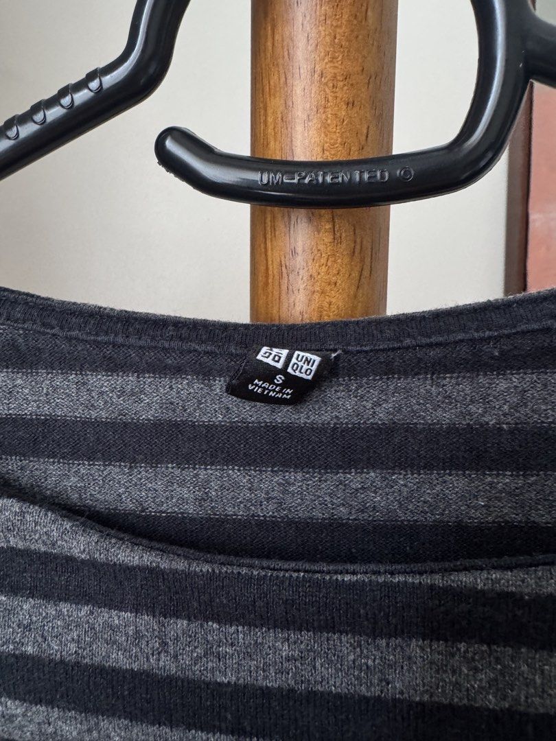 Uniqlo Striped Short Sleeve Top (Category: Shirts) located in Pasig City. Submitted by kutleyn (Listing ID 1465657151, Image 2). Description: - Brand: Uniqlo - Design: Black and grey horizontal stripes with a crew neckline - Fit: Relaxed, boxy cut - Size: S (Made in Vietnam) - Material: Soft knit for everyday comfort - Condition: Clean and ready to wear.