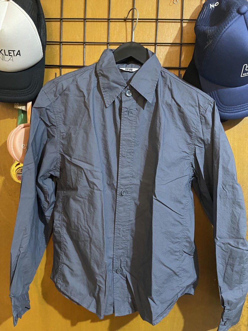 Uniqlo U Button-Down Shirt Size M Grey (Category: Tshirts & Polo Shirts ) located in Pasay City. Submitted by etcunlimited0 (Listing ID 1465689962, Image 2). Description: - Brand: Uniqlo U - Item: Button-down long sleeve shirt - Color: Dark grey blue - Size: Medium (Standard Fit) - Details: Regular collar, front button closure - Origin: Made in China - Style: Clean look, perfect for casual or smart casual wear - declines .