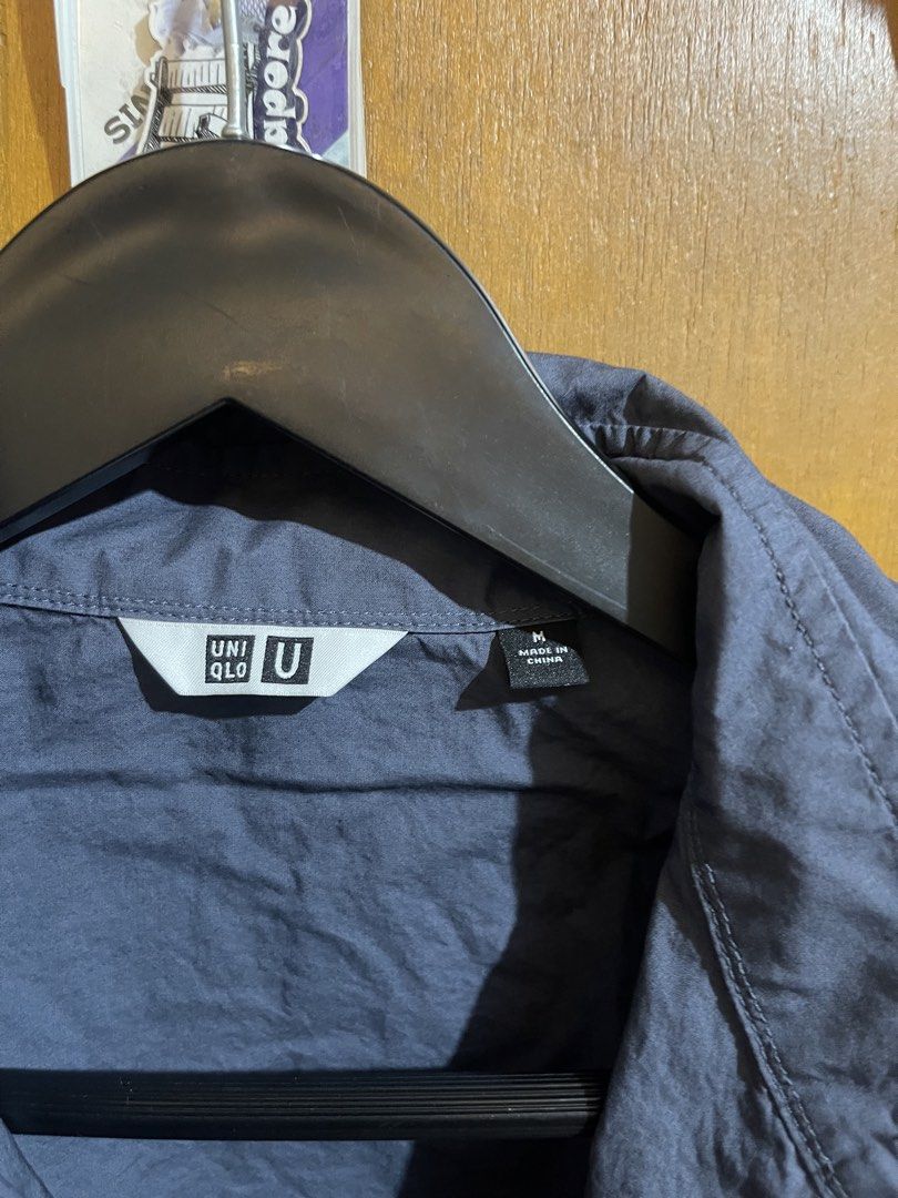 Uniqlo U Button-Down Shirt Size M Grey (Category: Tshirts & Polo Shirts ) located in Pasay City. Submitted by etcunlimited0 (Listing ID 1465689962, Image 3). Description: - Brand: Uniqlo U - Item: Button-down long sleeve shirt - Color: Dark grey blue - Size: Medium (Standard Fit) - Details: Regular collar, front button closure - Origin: Made in China - Style: Clean look, perfect for casual or smart casual wear - declines .