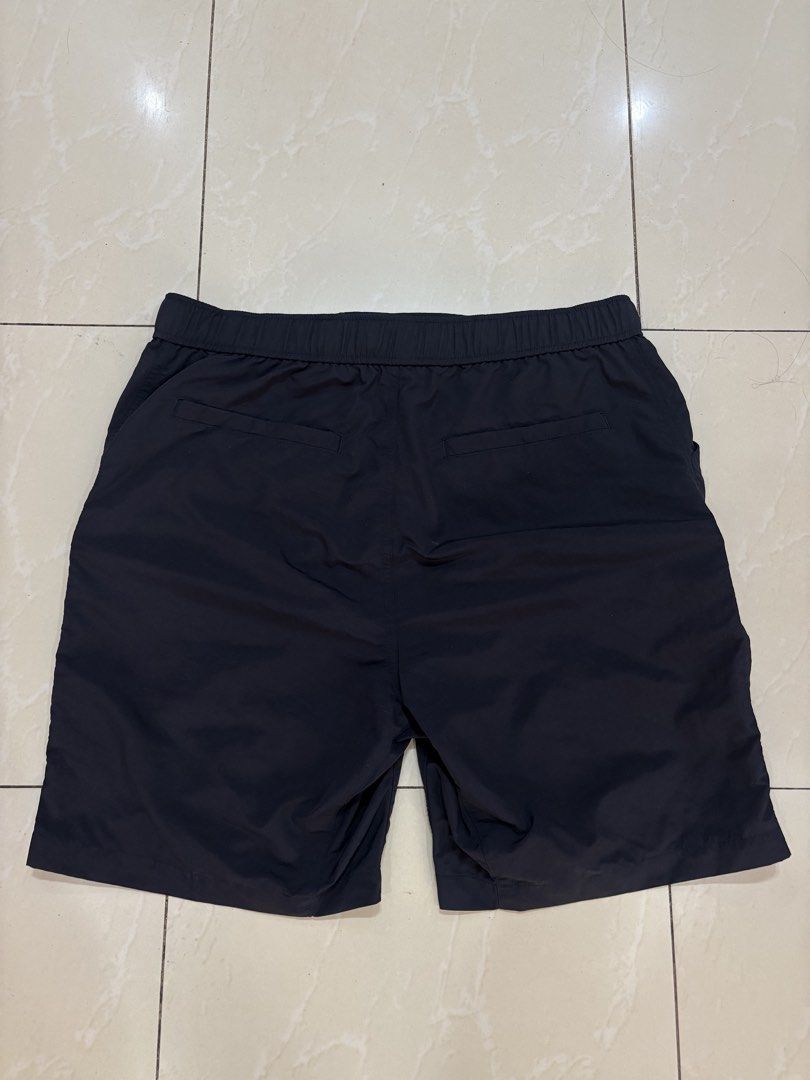 Uniqlo Utility Geared Shorts (Category: Shorts) located in Iligan City. Submitted by thrift4dayz (Listing ID 1465592311, Image 2). Description: - Size: Large - 34” - Material: Lightweight nylon, ideal for outdoor activities and casual wear - Waistband: Elastic at the back for added comfort, featuring a built-in adjustable belt with buckle - Almost brand new condition .