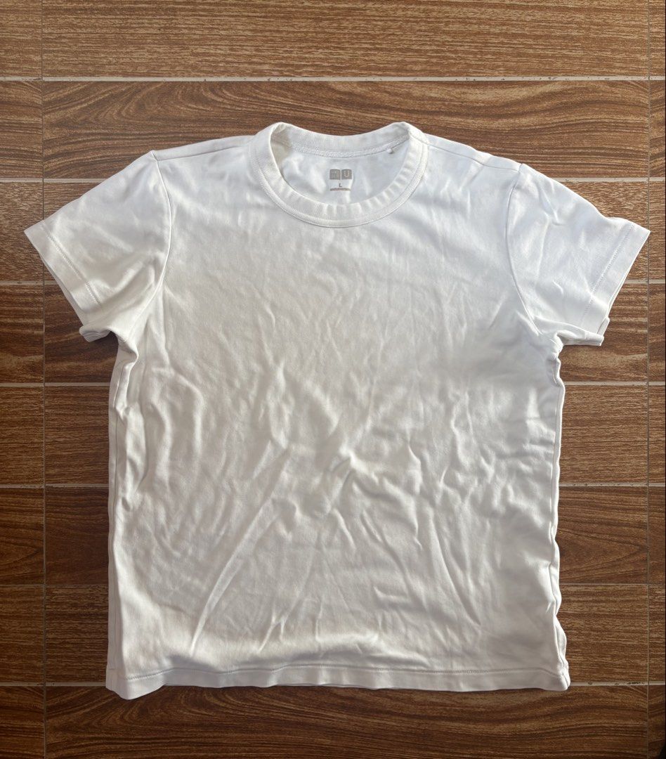 Uniqlo Womens Plain White Shirt (Category: Shirts) located in Manila. Submitted by selectors_club26 (Listing ID 1465635297, Image 1). Description: Color rate: 9.5/10 Dimes: 17x21 No issue.