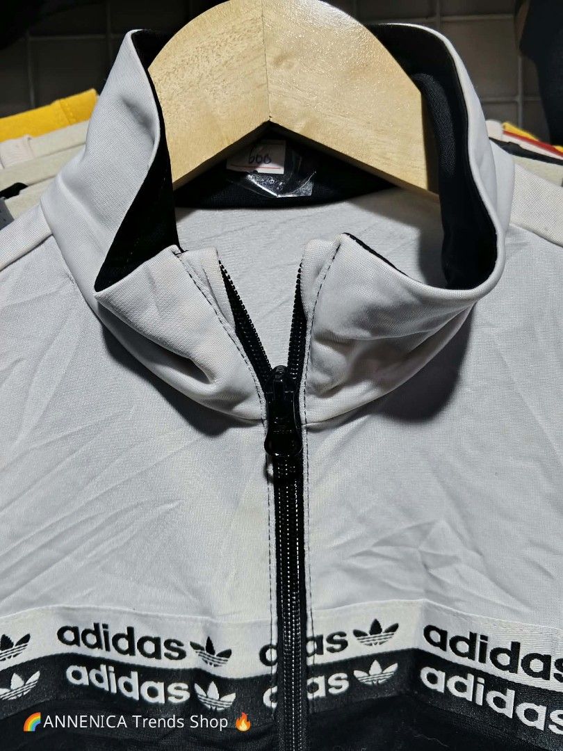 Unisex Jacket (Category: Coats, Jackets and Outerwear) located in Bulacan. Submitted by ukaybrandedshop (Listing ID 1465598204, Image 3). Description: Adidas Originals Taped Tracktop Jacket - Black / White - Size L PRICE: ₱600 *DESCRIPTION: 🔥 ADIDAS ORIGINALS TAPED TRACKTOP - LEGIT 🔥 Brand: Adidas Originals Color: White / Black - two tone, malinis Condition: 9.5/10 Excellent - No issue, zip smooth, print buo pa Material: 100% Polyester Recycled