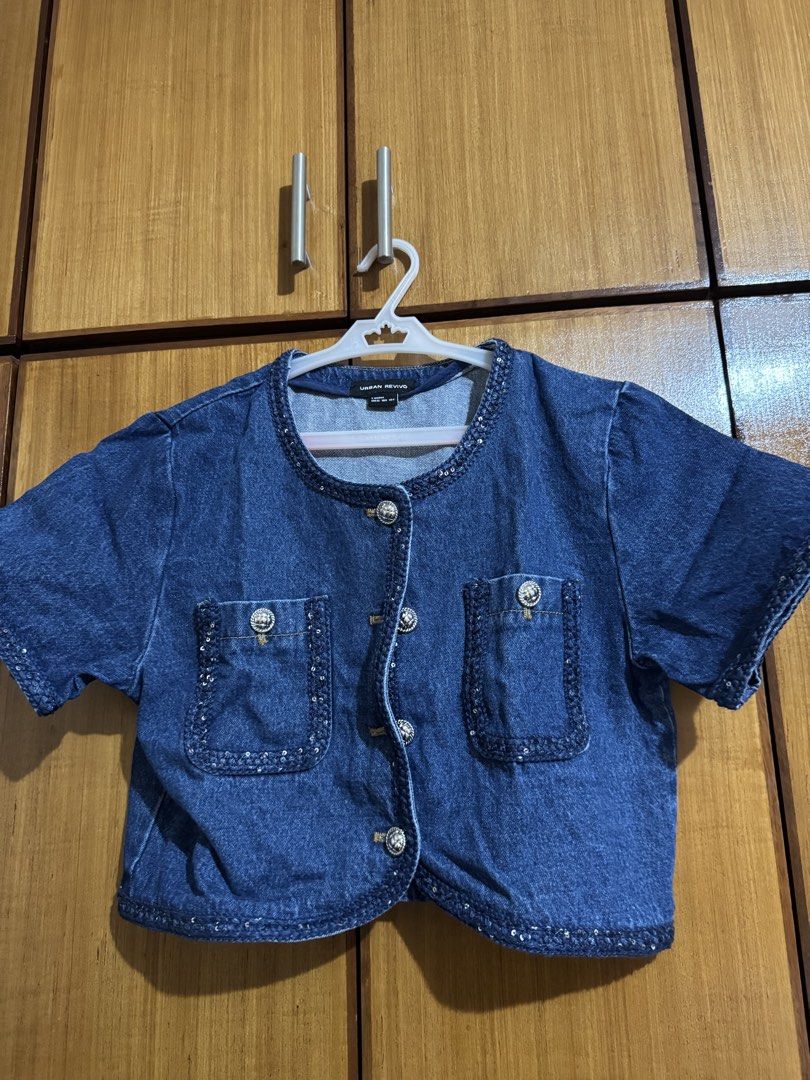 Urban Revivo Denim Crop Top Jacket (Category: Coats, Jackets and Outerwear) located in Santa Cruz, Pampanga. Submitted by eygee_rp (Listing ID 1465725039, Image 1). Description: - Brand: Urban Revivo - Style: Denim crop top jacket with short sleeves and round neckline - Size: S (EUR36, UK8, US4) - Details: Decorative silver buttons, two chest pockets, and subtle sequin trim on collar, placket, pockets, and hem - Fit: Structured fit with neat stit