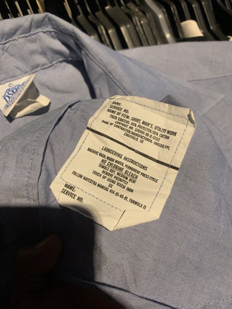 US Navy Utility Work Shirt Light Blue DSCP Quarterdeck Collection (Category: Tshirts & Polo Shirts ) located in Naga. Submitted by than09070539101 (Listing ID 1465748810, Image 3). Description: - Authentic US Navy utility work shirt from the DSCP Quarterdeck Collection - Color: Light blue - Material: 65% polyester and 35% cotton blend for durability and comfort - Design: Standard button-down front, classic collar, and two functional chest pockets