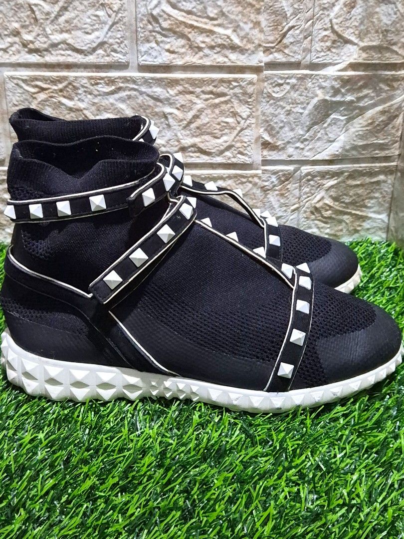 Valentino Garavani Rockstud Body Tech Sock Sneaker (Category: Sneakers & Footwear) located in Antipolo. Submitted by saribymonica (Listing ID 1465731224, Image 3). Description: Authentic Valentino Garavani Rockstud Body Tech Sock Sneakers Size: EU 36.5 (36 ½) Shoes only Design Features: Black technical knit sock upper featuring an adjustable Velcro ankle strap adorned with signature white rubber pyramid rockstuds and a ridged white rubber sole. E