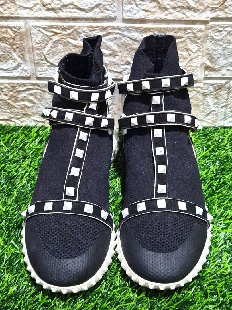 Valentino Garavani Rockstud Body Tech Sock Sneaker (Category: Sneakers & Footwear) located in Antipolo. Submitted by saribymonica (Listing ID 1465731224, Image 1). Description: Authentic Valentino Garavani Rockstud Body Tech Sock Sneakers Size: EU 36.5 (36 ½) Shoes only Design Features: Black technical knit sock upper featuring an adjustable Velcro ankle strap adorned with signature white rubber pyramid rockstuds and a ridged white rubber sole. E