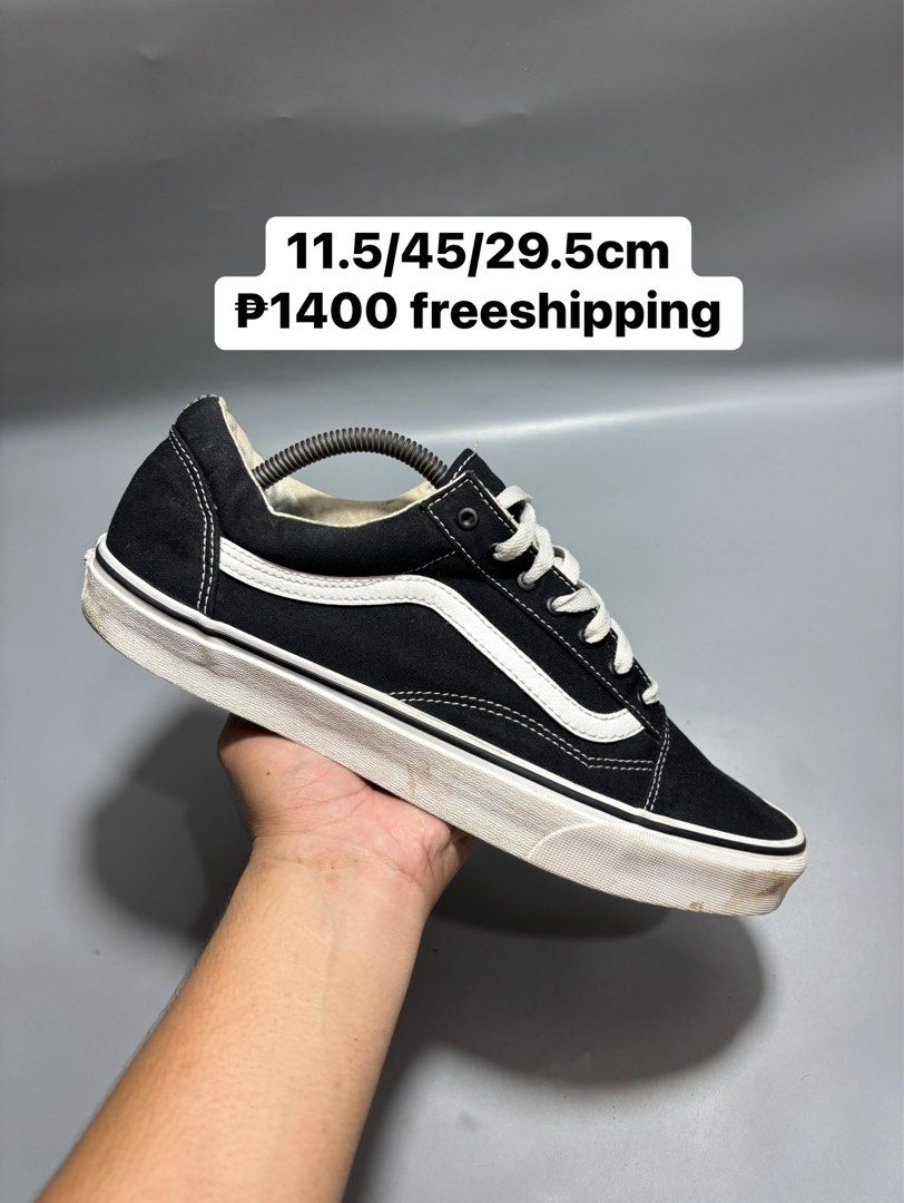Vans Old Skool Black White Size 11.5 US (Category: Sneakers) located in Butuan. Submitted by shoeetasho (Listing ID 1465757440, Image 1). Description: - Brand: Vans Old Skool Skate Shoes - Color: Classic Black canvas with White leather side stripe and matching laces - Size: 11.5 US Men / 13.0 US Women / 45 EUR / 29.5 cm - Origin: Made in Vietnam - Condition: Good overall wear, white rubber midsoles have minor dirt spots, durable waffle outsoles -