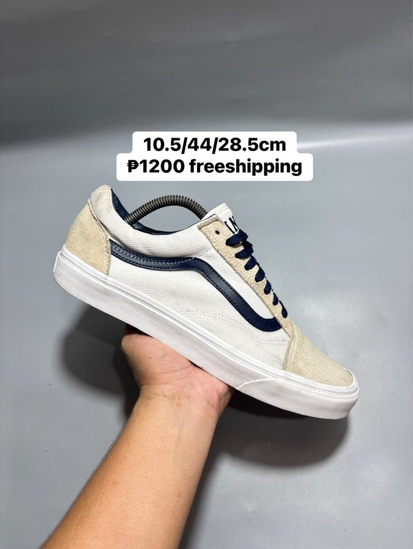 Vans Old Skool White Navy Blue Size US 10.5 (Category: Sneakers) located in Butuan. Submitted by shoeetasho (Listing ID 1465757284, Image 1). Description: - Model: Vans Old Skool - Colorway: White and Navy Blue with Cream Suede toe caps and heel counters - Size: US Men's 10.5 / UK 9.5 / EUR 44.0 / 28.5 cm - Details: Navy laces, iconic side stripe, and Vans tongue tag - Condition: Clean white midsoles, Made in Vietnam - Perks: FREE shipping includ