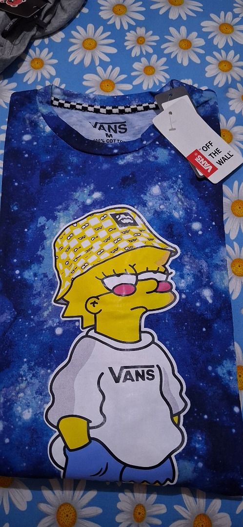 Vans Space Graphic T-Shirt Size M (Category: Tshirts & Polo Shirts ) located in Manila. Submitted by katkween23 (Listing ID 1465633369, Image 1). Description: - Brand: Vans - Design: Blue space galaxy print with Bart/Lisa Simpson character in bucket hat and Vans - Size: Medium - Material: 100% cotton - Condition: Brand new with original tags - Style: Classic streetwear, perfect for everyday wear.
