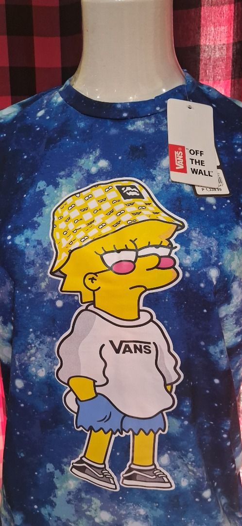 Vans Space Graphic T-Shirt Size M (Category: Tshirts & Polo Shirts ) located in Manila. Submitted by katkween23 (Listing ID 1465633369, Image 2). Description: - Brand: Vans - Design: Blue space galaxy print with Bart/Lisa Simpson character in bucket hat and Vans - Size: Medium - Material: 100% cotton - Condition: Brand new with original tags - Style: Classic streetwear, perfect for everyday wear.