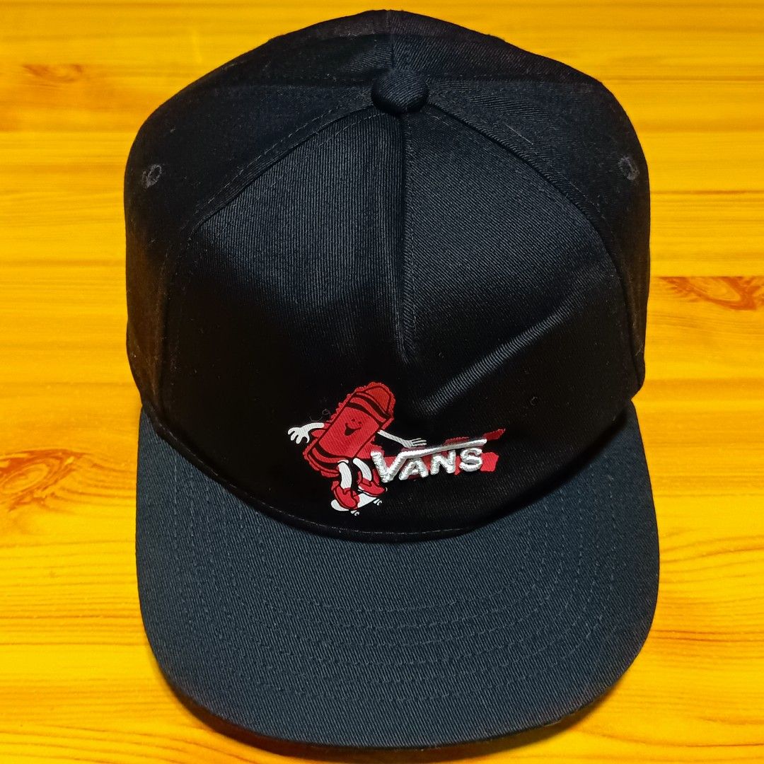 Vans x Crayola Black Snapback Cap (Category: Caps & Hats) located in Manila. Submitted by caps08 (Listing ID 1465745287, Image 2). Description: - Brand: Vans x Crayola - Color: Black with red crayon character graphic - Details: Crayola logo embroidered on the side, adjustable snapback closure, flat brim - Fit: Standard fit - Condition: Brand new / Excellent - Style: Streetwear accessory - Mode of Payment: Gcash / Bank Transfer - Shipping: Via cou