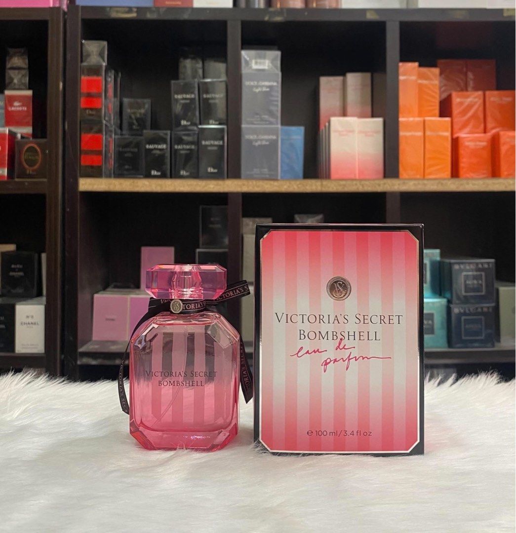Victoria's Secret Bombshell Eau de Parfum 100ml (Category: Fragrance & Deodorants) located in Taguig. Submitted by aizonlineshopph (Listing ID 1465634115, Image 3). Description: - Authentic Victoria's Secret Bombshell fragrance set - Includes 100ml / 3.3 fl oz Eau de Parfum spray - Comes with original matching box packaging - Features iconic pink and white stripes with black ribbon accent - Brand new, unused, and properly stored - 100% authentic 