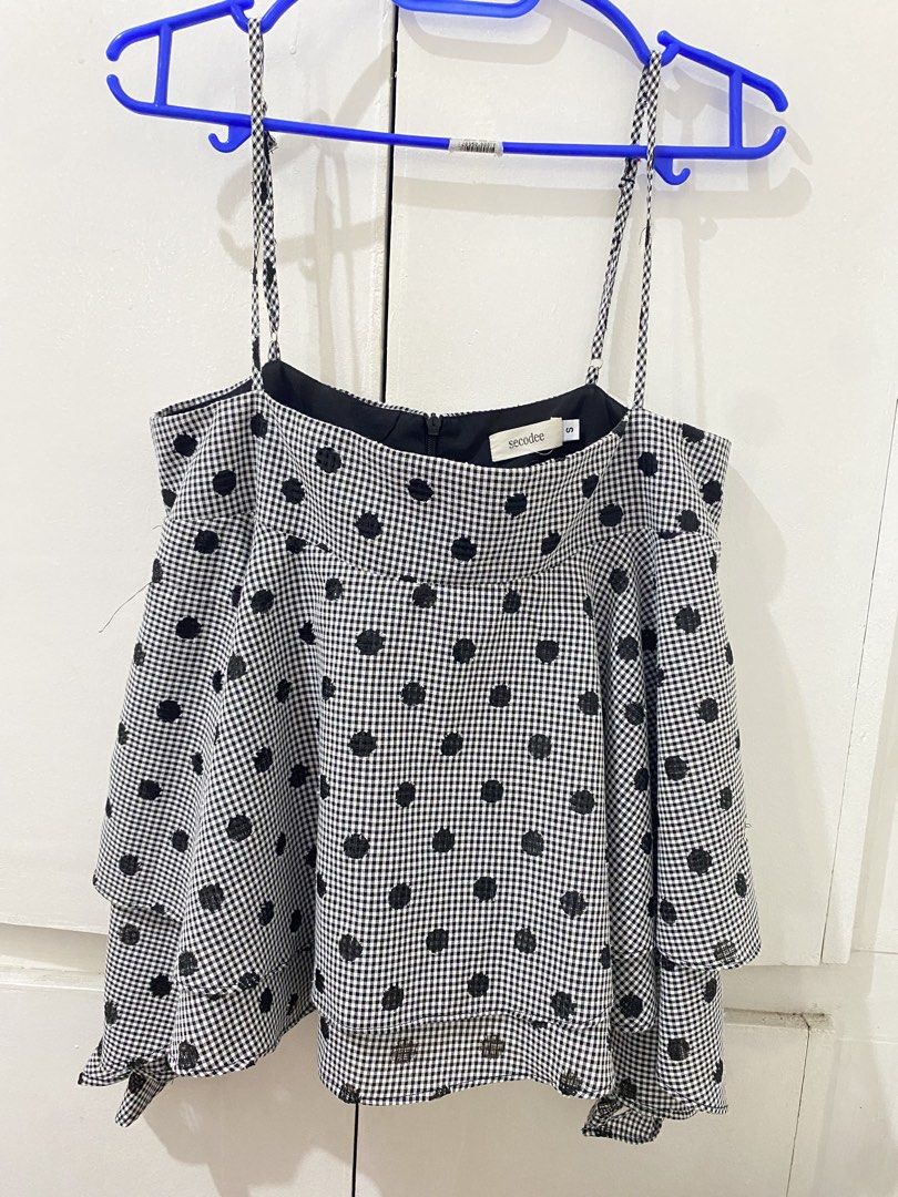 Vietnam Secodee Black and White Gingham Polka Dot Top Size S (Category: Sleeveless) located in Manila. Submitted by kooarchives (Listing ID 1465588211, Image 2). Description: - Sorry got this for 1500 :( - Brand: Secodee - Size: Small (tag attached) - Pattern: Black and white gingham with textured black polka dots - Details: Adjustable spaghetti straps, square neckline, back zipper closure - Style: Layered ruffle flare silhouette - Condition: Cle
