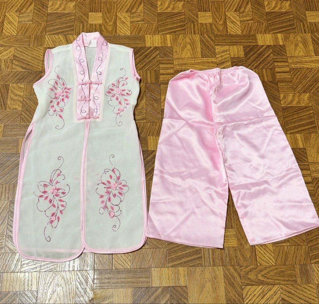 Vietnamese Costume Set (Category: Babies & Kids Fashion) located in Quezon City. Submitted by frappes (Listing ID 1465701766, Image 1). Description: - Traditional Vietnamese outfit in light pink and white - Sleeveless sheer tunic with delicate floral embroidery - Matching satin pants with a comfortable elastic waistband - Made in Vietnam - Care: Machine wash warm - Condition: Fabric and stitching are very clean (note: tag has a small mark over pa
