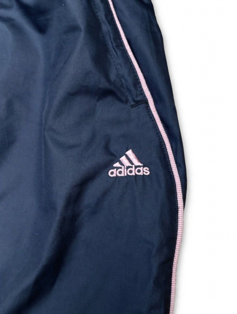 Adidas Vintage Track Pants (2006) (Category: Activewear) located in Manila. Submitted by hiddenvaultph (Listing ID 1465729475, Image 2). Description: ✅Pristine condition ✅ Size: UK 12 / Waist 28-34 garterized / Length 40 ✅ Made in Japan - 2006 vintage (Y2K) ✅ Navy + Pink piping - rare color ✅ No issue - no butas, no fading, garter goods pa ✅ Embroidered logo .