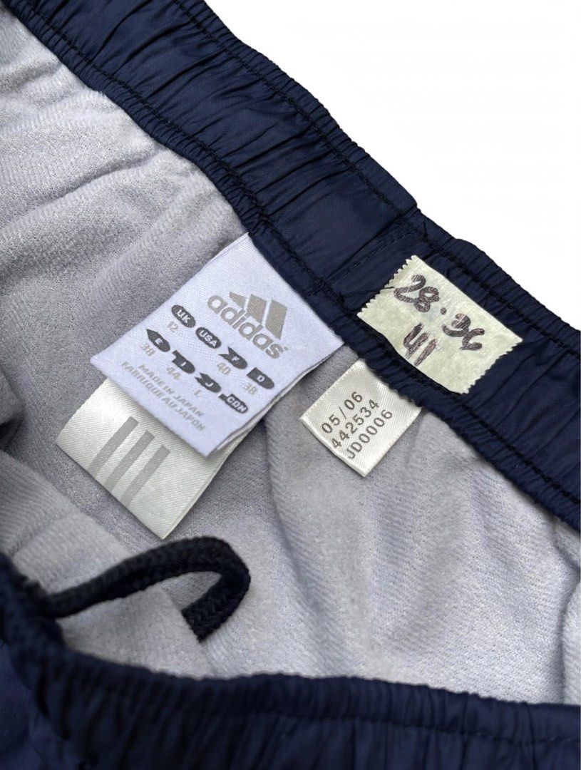 Adidas Vintage Track Pants (2006) (Category: Activewear) located in Manila. Submitted by hiddenvaultph (Listing ID 1465729475, Image 3). Description: ✅Pristine condition ✅ Size: UK 12 / Waist 28-34 garterized / Length 40 ✅ Made in Japan - 2006 vintage (Y2K) ✅ Navy + Pink piping - rare color ✅ No issue - no butas, no fading, garter goods pa ✅ Embroidered logo .
