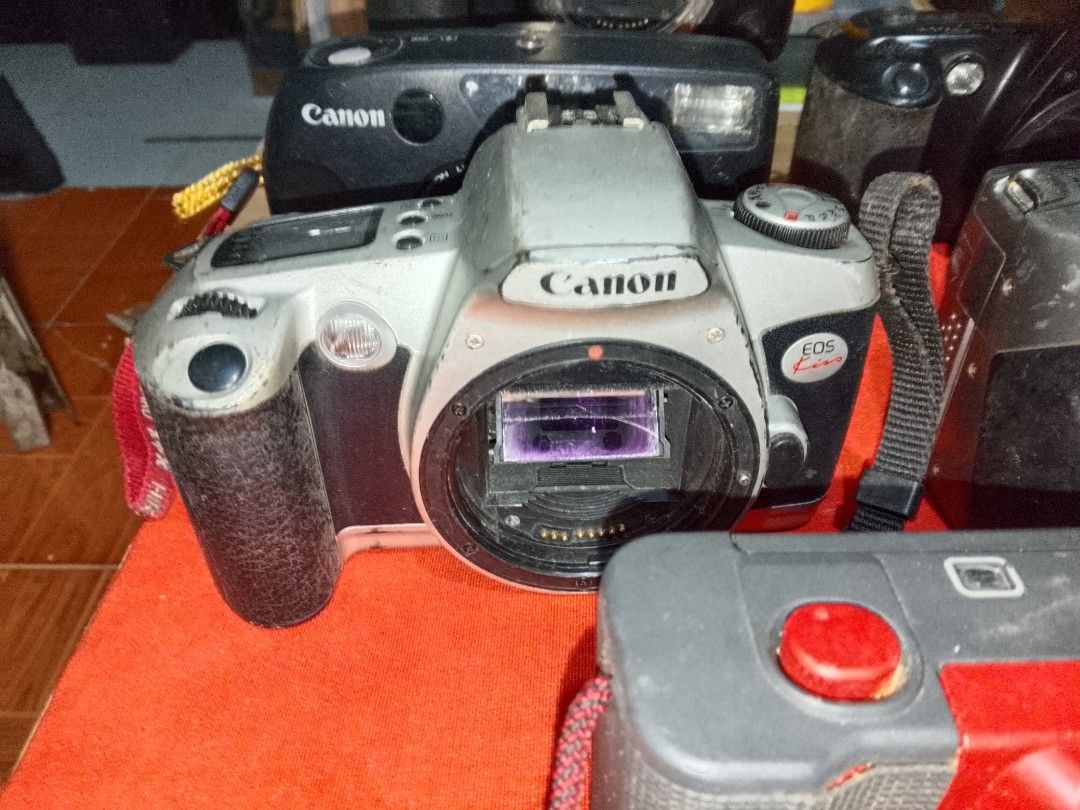 Vintage Canon Cam Collection (Category: Vintage Collectibles) located in Santo Tomas. Submitted by retrotastic (Listing ID 1465602504, Image 3). Description: all 6pcs bundle for ₱800Canon for display Cameras. Declared not working, as is. Maybe used for parts or just plain collection or just recondition it enjoy old cameras.