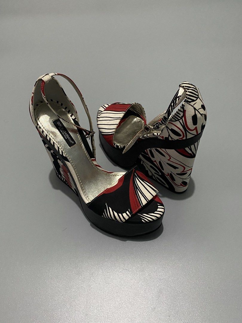 Vintage Dolce & Gabbana platform Sandals/Heels (Category: Sneakers & Footwear) located in Cebu City. Submitted by dfindss. (Listing ID 1465606727, Image 1). Description: Dolce & Gabbana platform sandals, highlighted by a bold red-and-white botanical leaf print on a chunky black block heel.