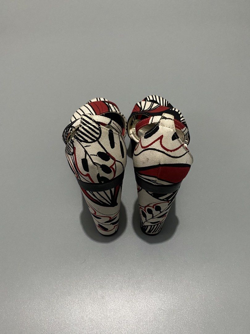 Vintage Dolce & Gabbana platform Sandals/Heels (Category: Sneakers & Footwear) located in Cebu City. Submitted by dfindss. (Listing ID 1465606727, Image 3). Description: Dolce & Gabbana platform sandals, highlighted by a bold red-and-white botanical leaf print on a chunky black block heel.