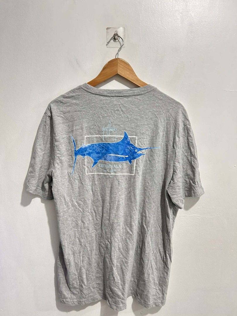 Vintage Guy Harvey Marlin Graphic Tee | Gray | L (Category: Tshirts & Polo Shirts ) located in Rizal. Submitted by thrift_finds_739 (Listing ID 1465685346, Image 2). Description: NO ISSUE Size: 3XL Color rate: 9/10 Length: 28 Width: 22 Please manage your expectations — we open premium bulk ukay bundles shipped directly from the US! 🇺🇸.