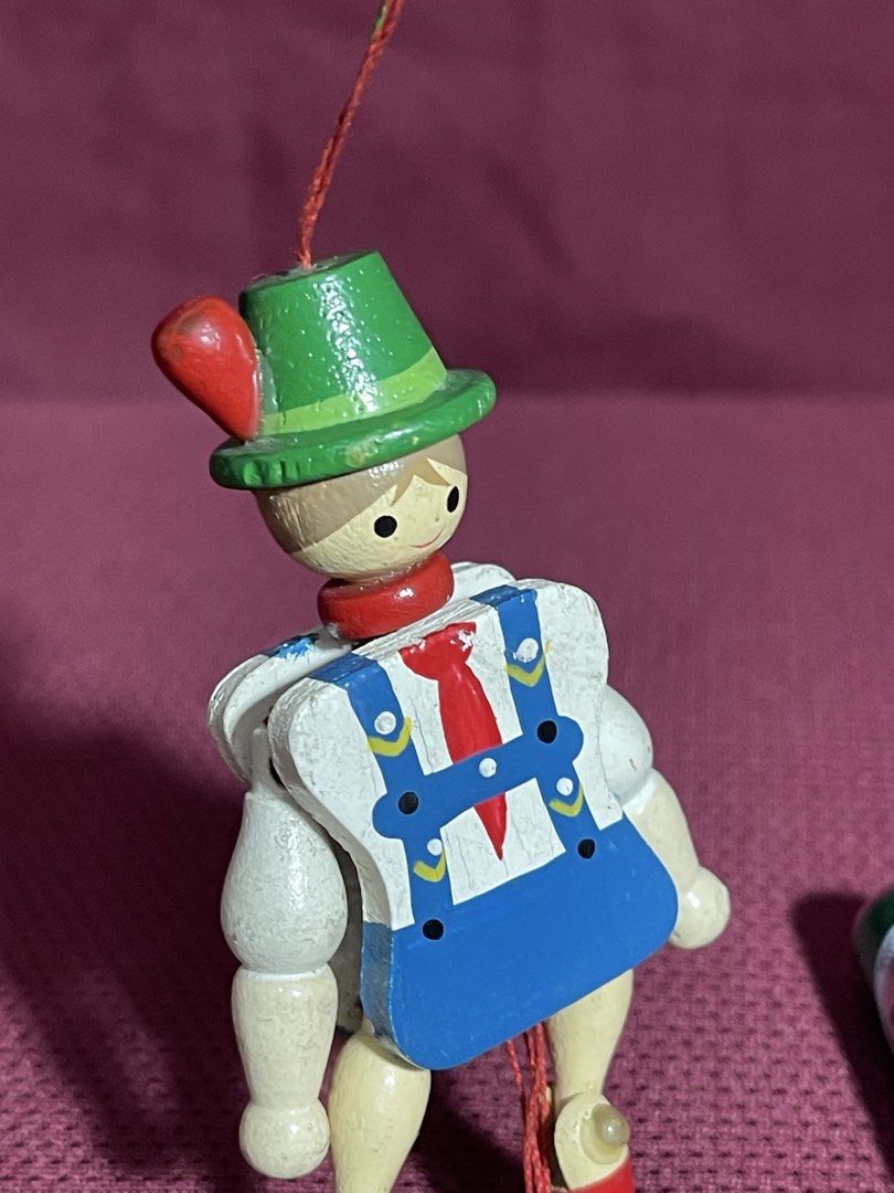 vintage Jumping Jack toy,(Hampelmann) (Category: Interactive Toys) located in Manila. Submitted by dstrangerthings (Listing ID 1465673938, Image 3). Description: This is a traditional German wooden Jumping Jack toy, also known as a Hampelmann. It is a jointed flat wooden figure with a pull string at the bottom. When the string is pulled, the figure’s arms and legs move up and down, making it “jump”. The toy is hand-painted and often used as a han