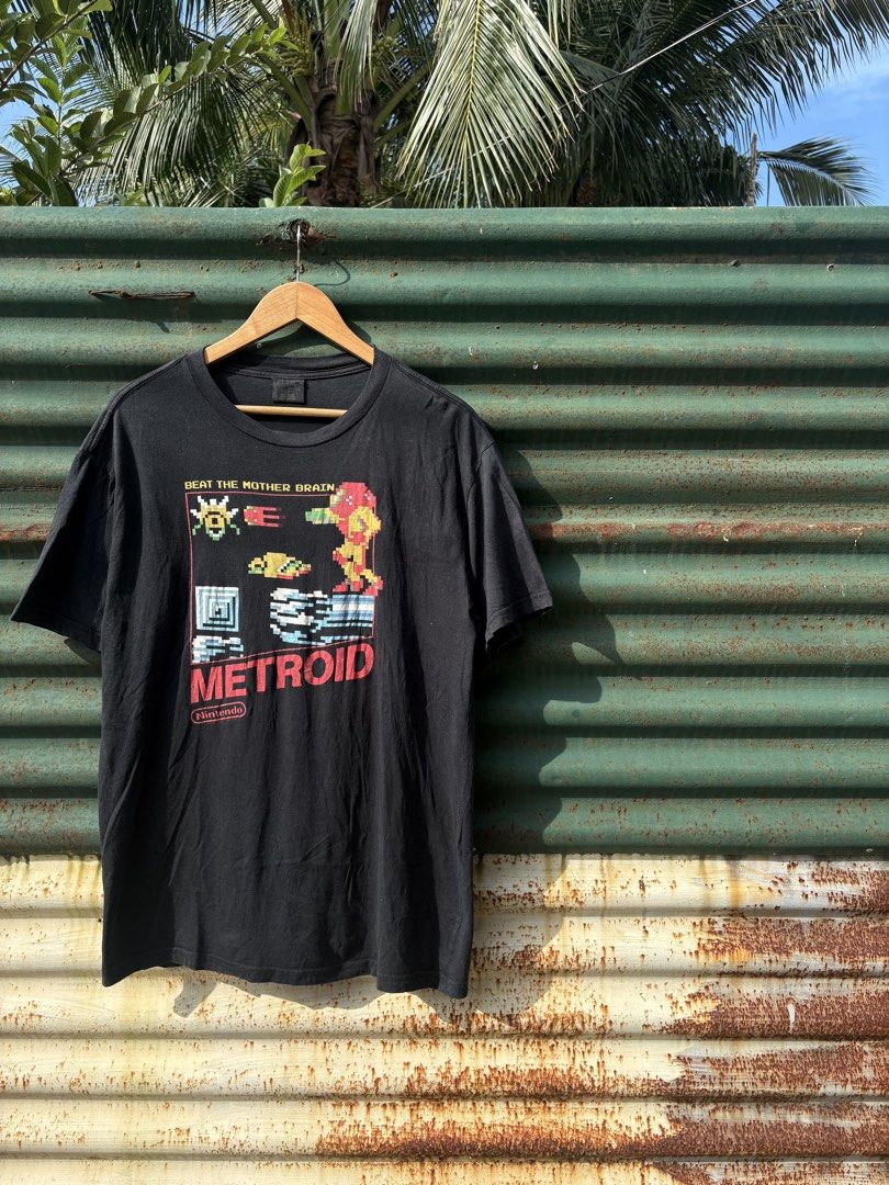 Vintage Metroid Gaming Tee (Category: Tshirts & Polo Shirts ) located in Cabiao. Submitted by thelifeofgelo (Listing ID 1465641011, Image 2). Description: Vintage Metroid Gaming Tee Width: 22.5 Length: 29 Issue: Multiple pinholes.