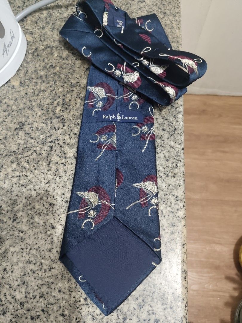 Vintage Navy Blue silk Necktie (Category: Ties) located in Manila. Submitted by deleonhann57311 (Listing ID 1465660761, Image 2). Description: Original.Vintage Navy blue silk neck tie.from Japan branded by Ralph Lauren..79 dollar rate because it's vintage but only 499 for the lowest price.