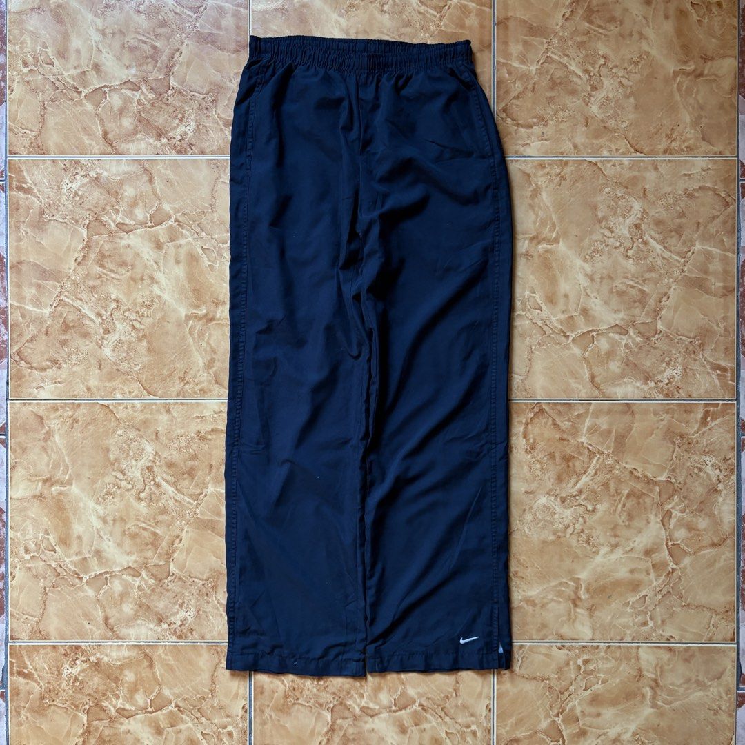 VINTAGE NIKE COTTON LINED TRACK PANTS (Category: Activewear) located in Manila. Submitted by mikodvn (Listing ID 1465639381, Image 1). Description: VINTAGE NIKE COTTON LINED TRACK PANTS WxL 30x41 STRETCHABLE WAIST LEG OPENING 9 9.5/10 CONDITION.