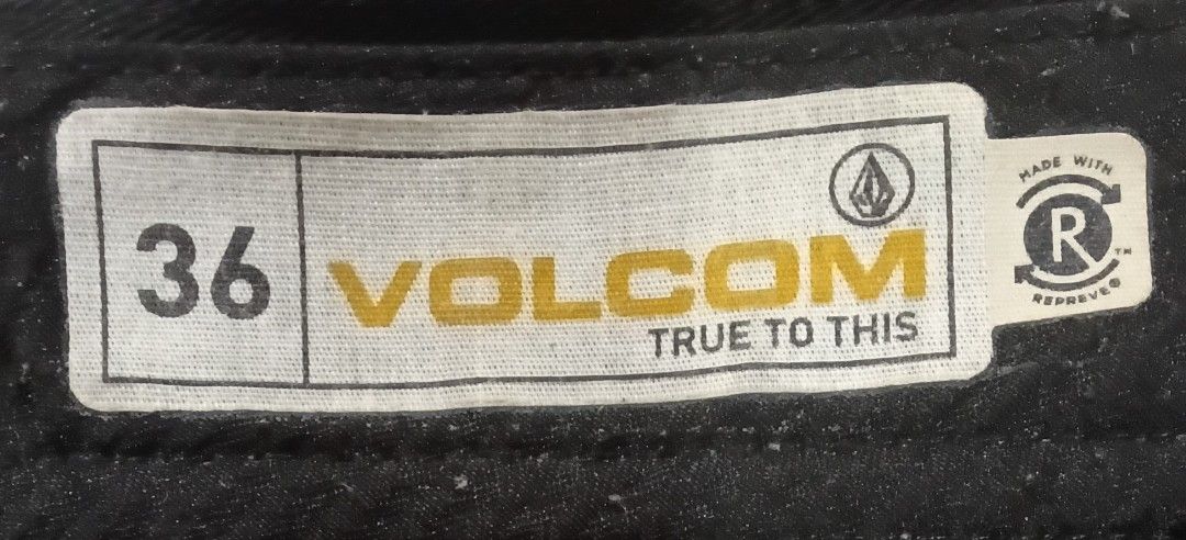 Volcom Black Shorts Size 36 (Category: Shorts) located in Caloocan City. Submitted by lourdma (Listing ID 1465636648, Image 1). Description: - Brand: Volcom - Size: 36 - Color: Solid black - Material: Eco-friendly Repreve recycled fabric - Closure: Button waist with branded metal hardware - Pockets: Back welt pockets with small Volcom logo tag - Condition: Clean and well-maintained.