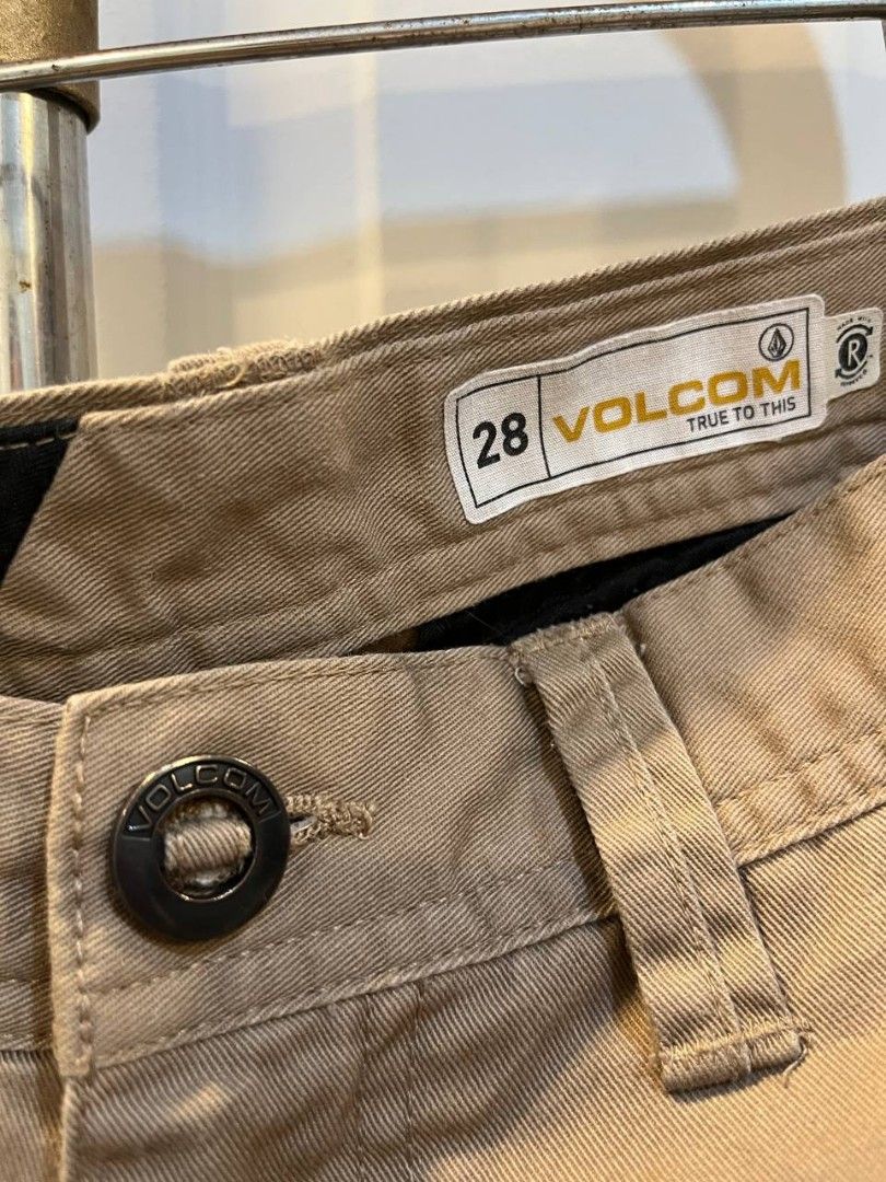 Volcom Chino Shorts Khaki Size 28 (Category: Shorts) located in Quezon City. Submitted by chicberry (Listing ID 1465715199, Image 3). Description: - Brand: Volcom - Size: 28 - Color: Khaki - Material: Sturdy cotton twill - Closure: Classic button fly with branded hardware - Pockets: Two front pockets and button-detail welt back pockets with woven logo tag - Condition: Great everyday staple piece, easy to dress up or down.
