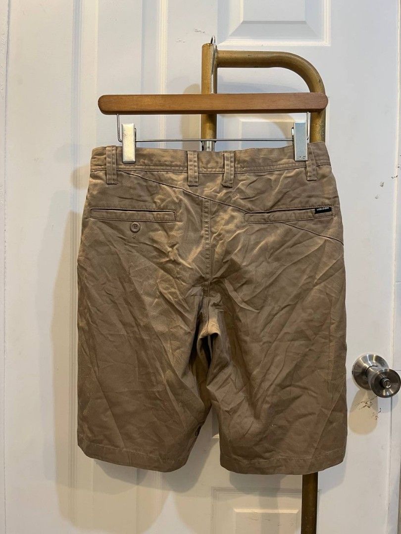 Volcom Chino Shorts Khaki Size 28 (Category: Shorts) located in Quezon City. Submitted by chicberry (Listing ID 1465715199, Image 2). Description: - Brand: Volcom - Size: 28 - Color: Khaki - Material: Sturdy cotton twill - Closure: Classic button fly with branded hardware - Pockets: Two front pockets and button-detail welt back pockets with woven logo tag - Condition: Great everyday staple piece, easy to dress up or down.