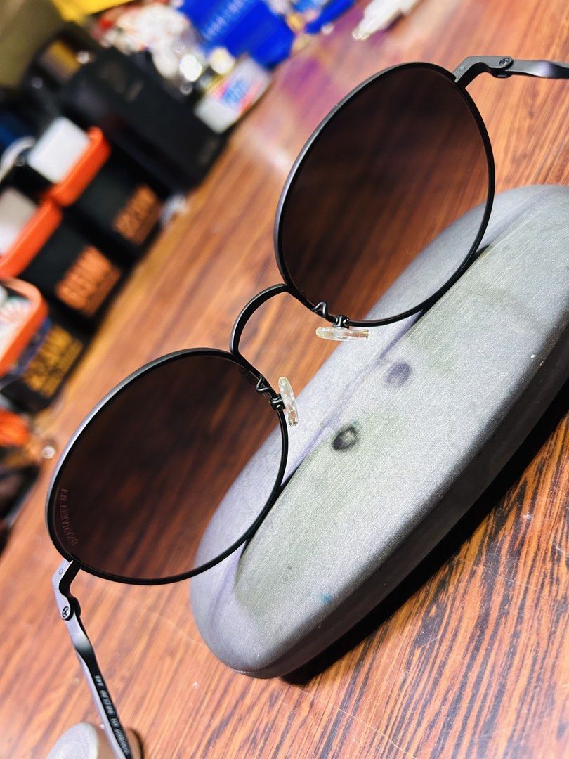VW Vera Wang Round Black Sunglasses (Category: Sunglasses & Eyewear) located in Manila. Submitted by starbalesukandjapansurplus (Listing ID 1465746818, Image 2). Description: - Brand: VW Vera Wang - Frame: Minimalist matte black metal with adjustable nose pads - Lenses: Round gradient, clear branding on right lens corner - Condition: Clean, no scratches on glass - Style: Great daily shades.