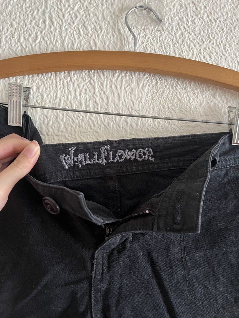 Wallflower Black Shorts (Category: Shorts) located in Cebu City. Submitted by danabelleza (Listing ID 1465629138, Image 2). Description: - Brand: Wallflower - Color: Classic black - Material: Comfortable, breathable cotton - Fit: Mid-rise waist - Features: Front pockets, button fly closure, and chic folded cuffs - Condition: Excellent basic for casual tees and crop tops.