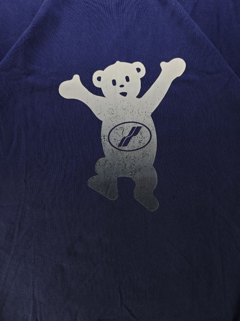Welldone Gradient Bear Navy Blue Tee (Category: Tshirts & Polo Shirts ) located in San Pedro. Submitted by chronothrift (Listing ID 1465652316, Image 2). Description: - Size: XL (W24 x 31L) - Condition: 9.2/10 - Color Rate: 9/10 - Flaws: ❌❌❌ (None) MOD: J&T Express / Lalamove / Meet MOP: Gcash / Bank Transfer.