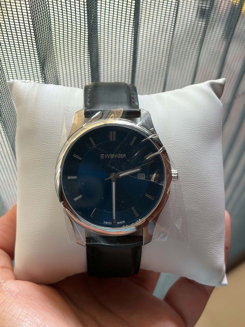 Wenger Swiss Made Watch with Extra Strap (Category: Men's Watches) located in Quezon City. Submitted by ohshoju (Listing ID 1465635514, Image 2). Description: ⌚ For Sale: Brand New Wenger Swiss Made Watch ⌚ Selling this authentic Wenger Swiss Made Watch in excellent, brand-new condition. Still has the protective plastic on the watch face and comes with the original box and warranty card. ✅ Swiss Made Quality ✅ Elegant Blue Dial ✅ Date Display Fea