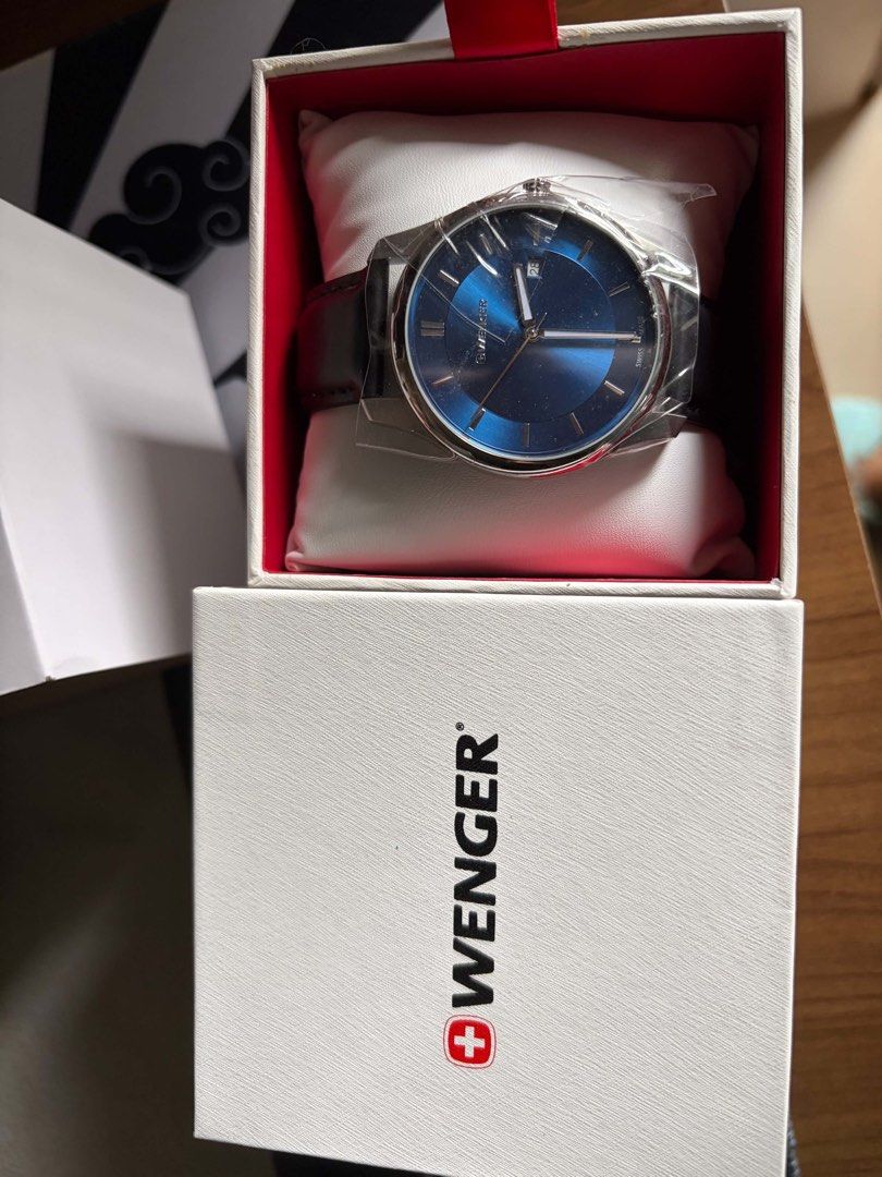 Wenger Swiss Made Watch with Extra Strap (Category: Men's Watches) located in Quezon City. Submitted by ohshoju (Listing ID 1465635514, Image 3). Description: ⌚ For Sale: Brand New Wenger Swiss Made Watch ⌚ Selling this authentic Wenger Swiss Made Watch in excellent, brand-new condition. Still has the protective plastic on the watch face and comes with the original box and warranty card. ✅ Swiss Made Quality ✅ Elegant Blue Dial ✅ Date Display Fea