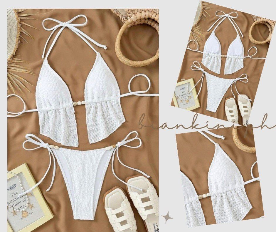 White Halter Bikini Set with Wooden Beads (Category: Bikinis & Swimsuits) located in Las Pinas. Submitted by kathybianca (Listing ID 1465663102, Image 1). Description: - Color: White - Style: Two-piece halter swimsuit with matching bottoms - Material: Textured crinkle fabric, fully lined - Details: Cute wooden bead accents on the front ties and adjustable side ties - Perfect for: Beach trips, pool days, and vacations.