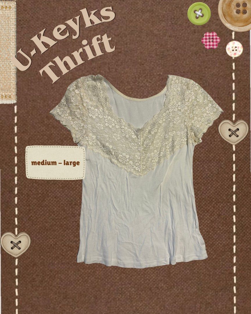 White Lace Accent Short Sleeve Top (Medium ~ Large) (Category: Blouses) located in Cavite. Submitted by ukeyks (Listing ID 1465706922, Image 1). Description: - Color: Cream - Style: Short sleeve pullover with wide scoop neck - Details: Beautiful lace accent across neckline and shoulders - Fit: Regular, comfortable fit (fits Medium to Large) - Fabric: Soft and cozy everyday wear .
