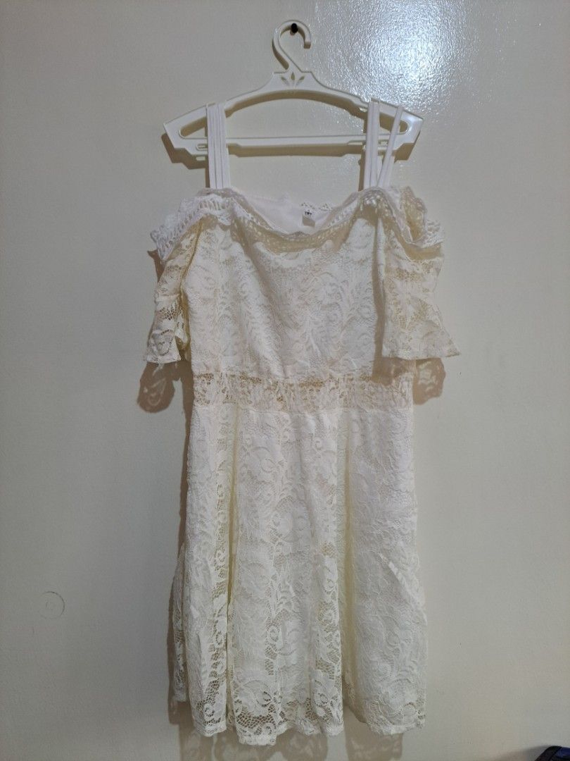 White Lace Off Shoulder Dress (Category: Dresses) located in Manila. Submitted by yselles__ (Listing ID 1465603223, Image 1). Description: - Style: Off-shoulder white lace dress with short sleeves - Comfort: Fully lined with a soft white inner layer - Condition: Great overall shape - Perfect for: Summer or casual outings.