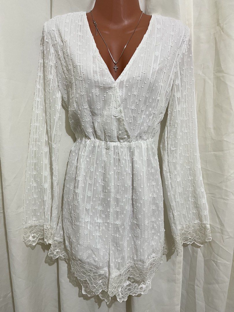 White Lace Trim Bell Sleeve Romper (Category: Rompers) located in Angeles City. Submitted by melloromi (Listing ID 1465693903, Image 1). Description: Worn once🤍 clean and already washed. Fits M-L frame.
