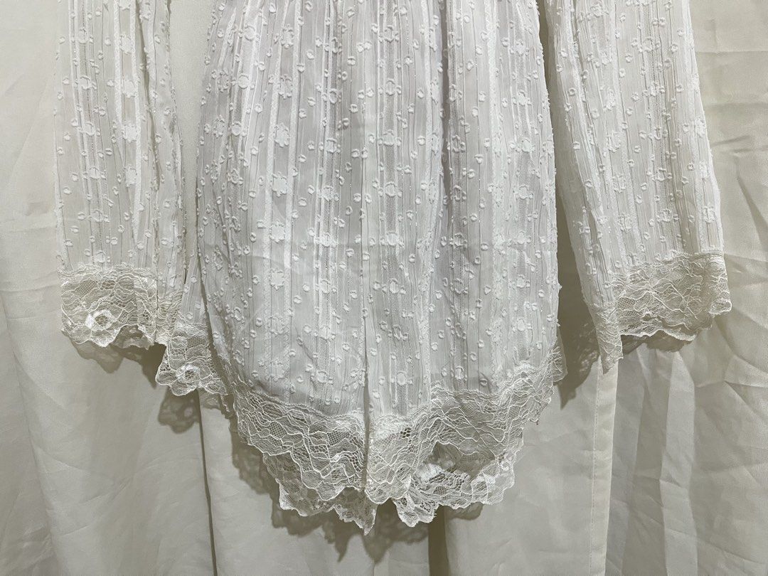White Lace Trim Bell Sleeve Romper (Category: Rompers) located in Angeles City. Submitted by melloromi (Listing ID 1465693903, Image 3). Description: Worn once🤍 clean and already washed. Fits M-L frame.