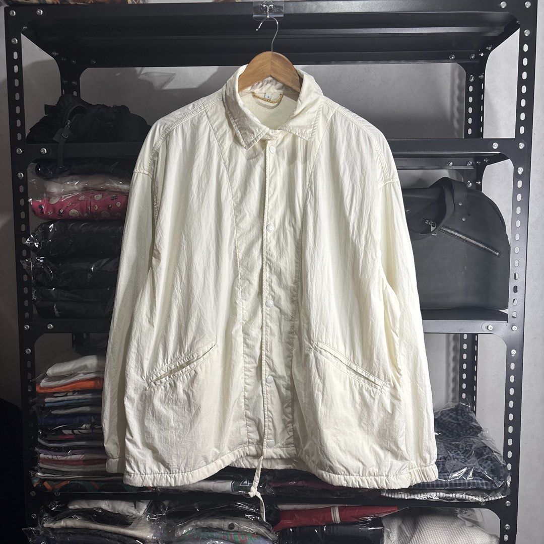 White Lightweight Windbreaker Jacket Size L (Category: Coats, Jackets and Outerwear) located in Cavite. Submitted by goodstayojan.cvt (Listing ID 1465720322, Image 1). Description: Random Comfy White Puffer Jacket L on tag(25 x 28 x 22sleeves) Verygood Condition No flaws! - Size: Large - Color: White - Material: Lightweight, breathable with inner mesh lining - Closure: Front buttons - Pockets: Two slanted front pockets - Fit: Adjustable drawstrin