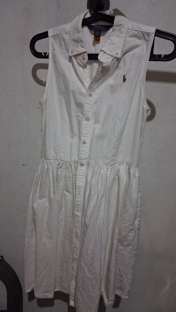 White Sleeveless Dress (Category: Dresses) located in Manila. Submitted by boldfish_512666 (Listing ID 1465743976, Image 1). Description: - Style: White sleeveless collared dress with front button closure - Size: 14 - Condition: Excellent pre-loved condition (ready to wear!).