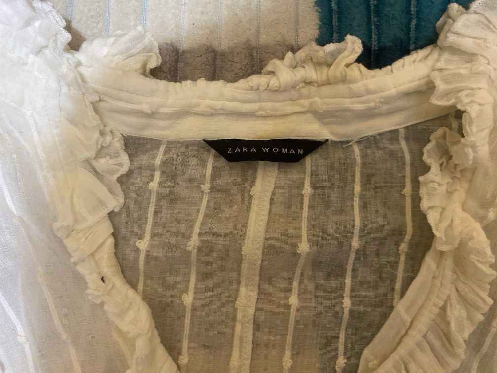 White ZARA Ruffled top (Category: Longsleeves) located in Manila. Submitted by pchyomi (Listing ID 1465689634, Image 2). Description: minor yellow stains.