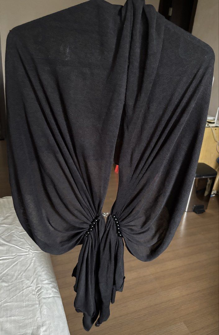 Willow Clothing Black Draped Shawl Wrap Scarf (Category: Scarves) located in Quezon City. Submitted by declutter_incorporated (Listing ID 1465599362, Image 1). Description: - Brand: Will Clot - Color: Black - Material: Lightweight and soft fabric - Design: Beautiful front drape with gathered ring detail and beaded accents - Occasion: Perfect for evening wear, parties, and special events - Fit: Comfortable and easy to throw over the shoulders.